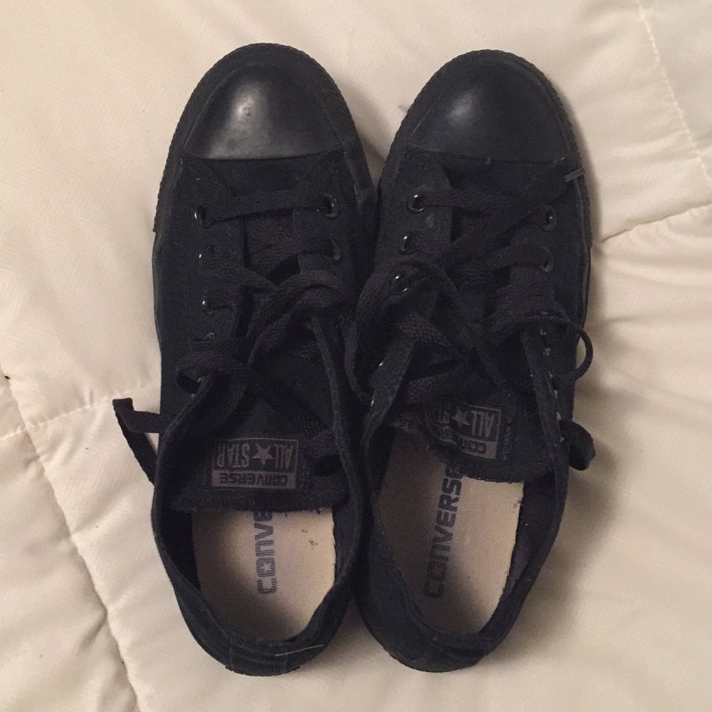 All black converse.